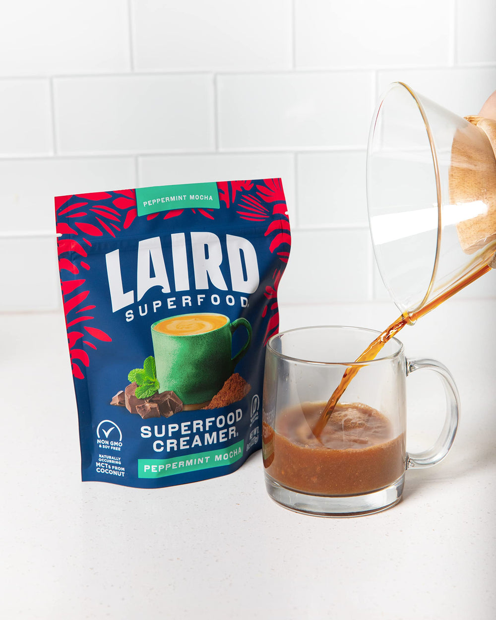 Laird Superfood pouring into coffee to add peppermint mocha flavor