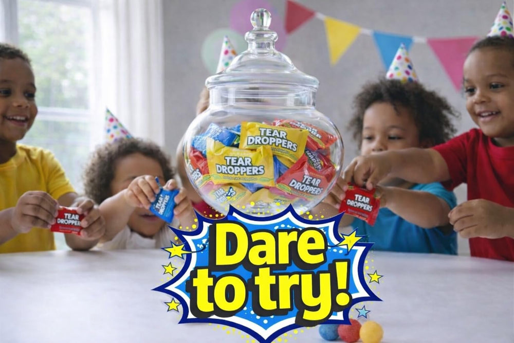 Lalees hand holding gumball to show size and portion control