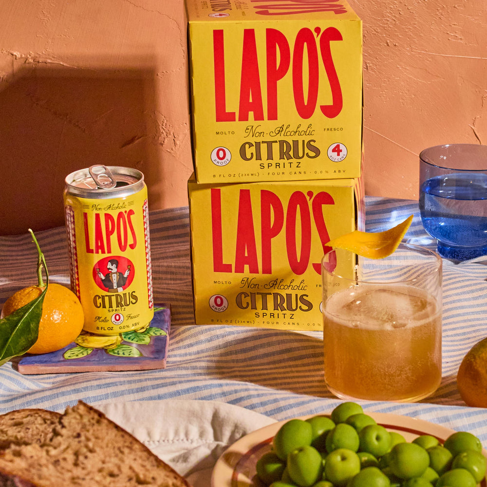 Lapo's garnished glass with orange slice illustrating elevated presentation