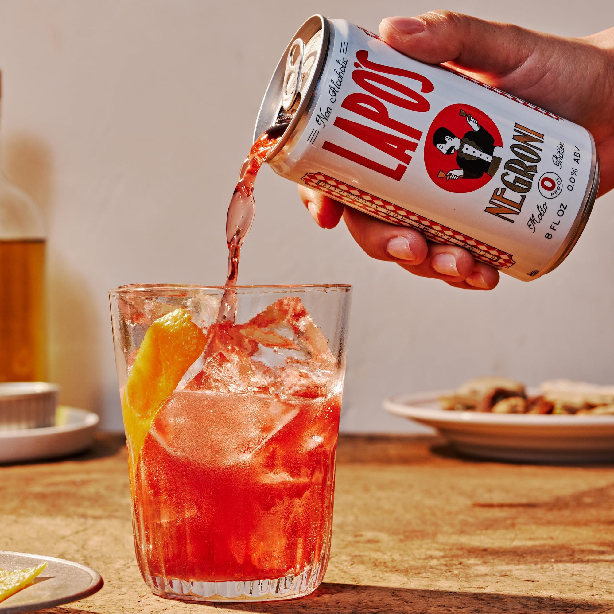 Lapo's Negroni in a coupe glass emphasizing elegant presentation
