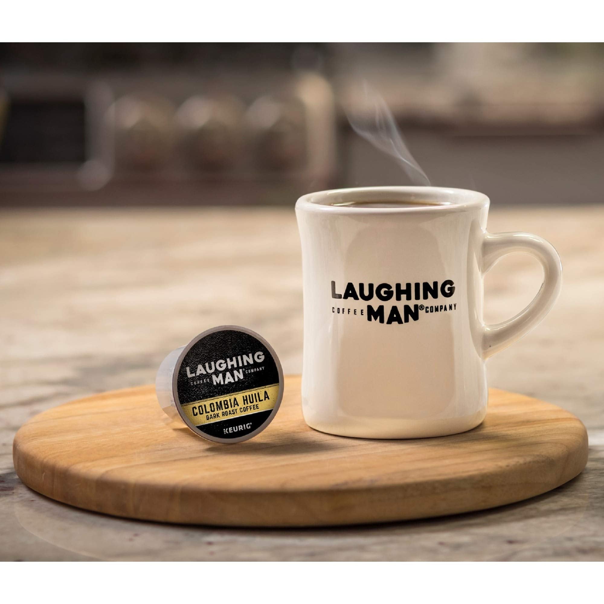 LAUGHING MAN certification labels showing Fair Trade and Orthodox Union Kosher