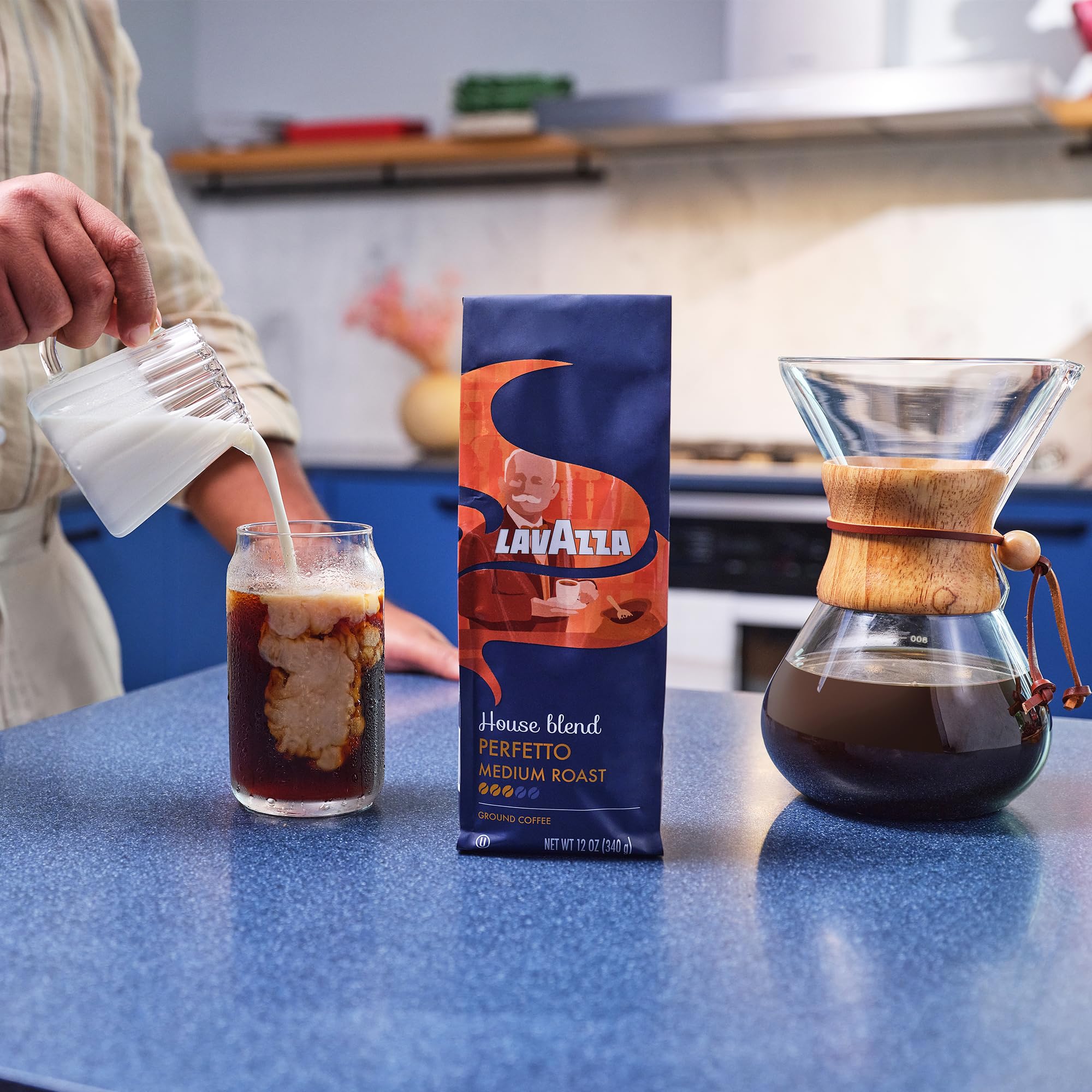 Lavazza lifestyle kitchen scene illustrating stocked supply and everyday coffee enjoyment