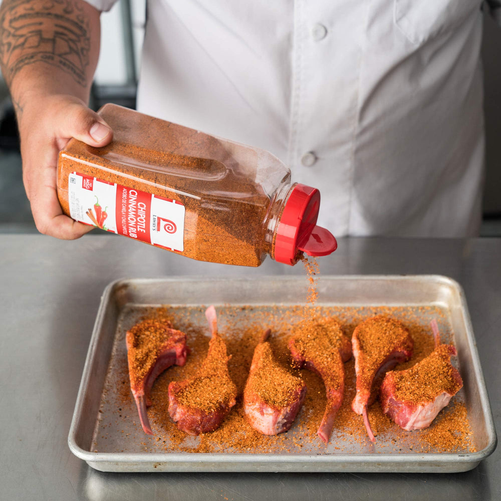 Lawry's bottle next to a measuring cup to show 27 oz scale and bulk value for kitchens