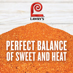 Lawry's rub being poured from container into spoon, illustrates easy dispensing and portion control