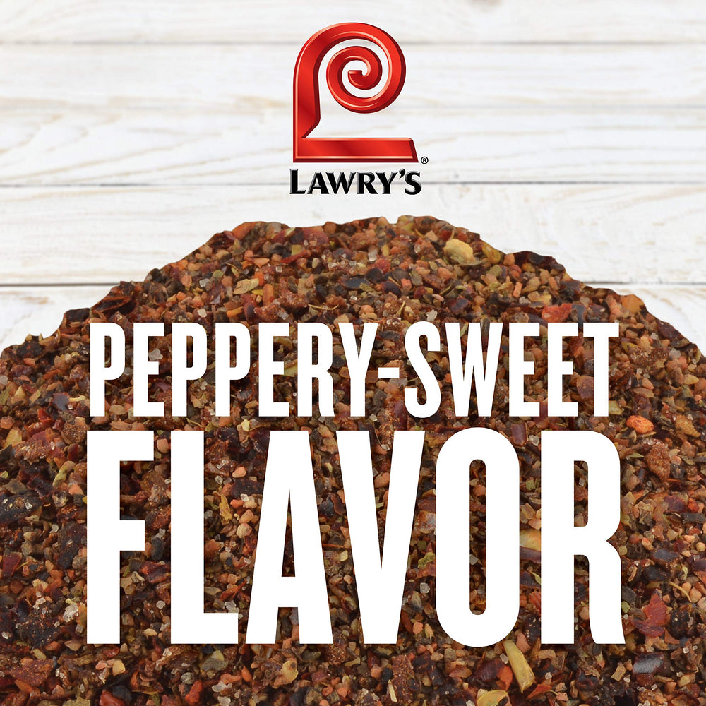 Lawry's spoonful revealing red bell pepper pieces and balanced seasoning