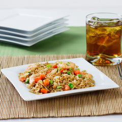 Grilled chicken brushed with Lawry's showing caramelized flavorful crust