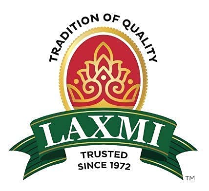 LAXMI jar held in hand to show 24oz scale and pantry-friendly size
