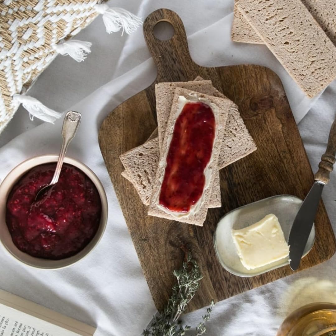 Le Pain des Fleurs crispbreads on a table with toppings showing entertaining use