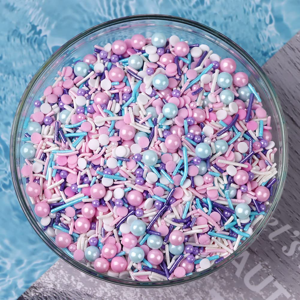 LEBERY sprinkles on party table with pastel cakes demonstrating cohesive theme styling