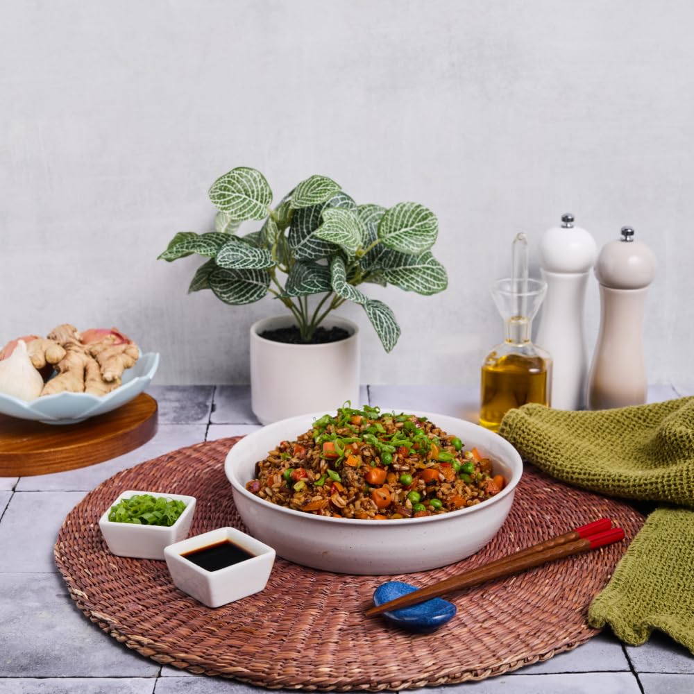 Sauceboat of Lee Kum Kee soy sauce for dipping showing controlled flavor enhancement benefit