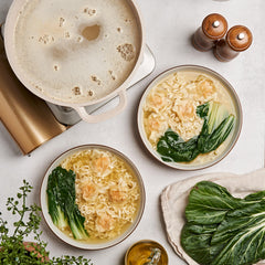 Lee Kum Kee pouring into soup pot to quickly create flavorful broth