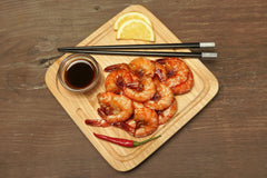 Lee Kum Kee soy sauce poured into a bowl highlighting rich color and enhanced flavor