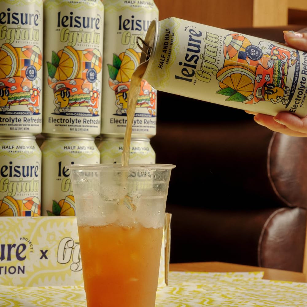 Leisure Half & Half 16 oz can held in hand for size and portion clarity