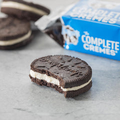 Lenny & Larry's cookies in hand demonstrating pack size and easy on-the-go portioning