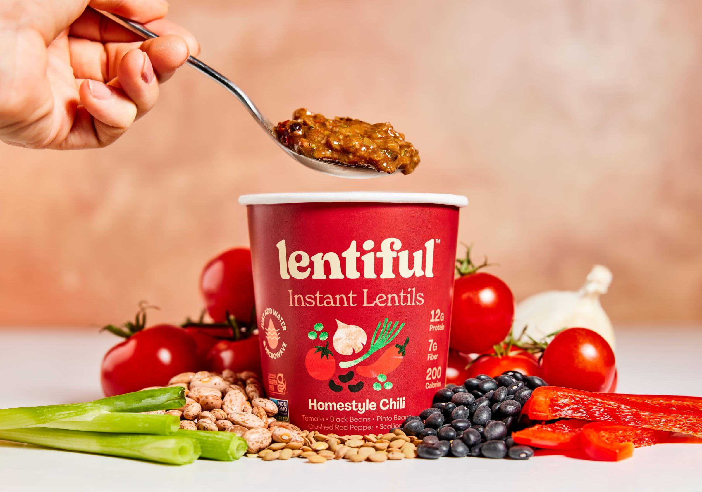 Lentiful cup held in hand to show portion size and portability benefit