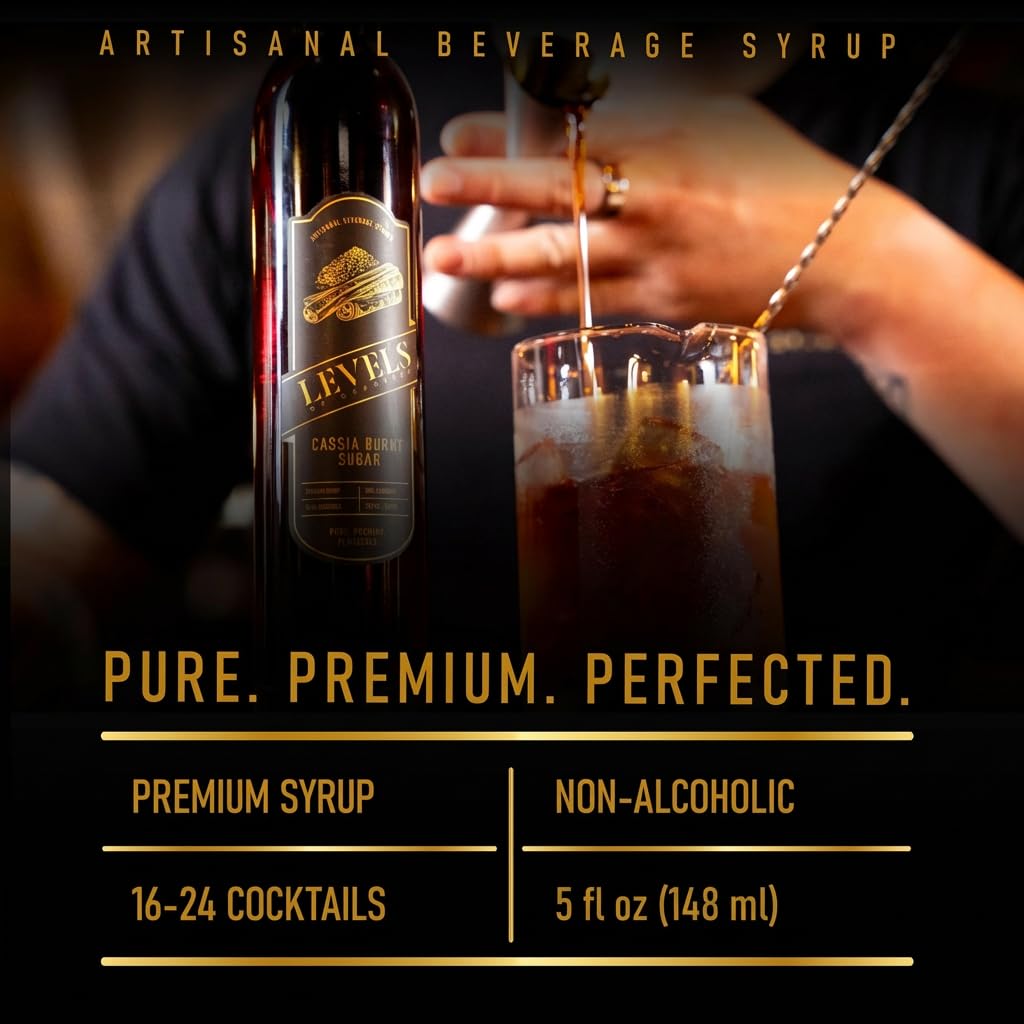 Levels of Grandeur syrup being poured into a cocktail — adds spiced sweetness