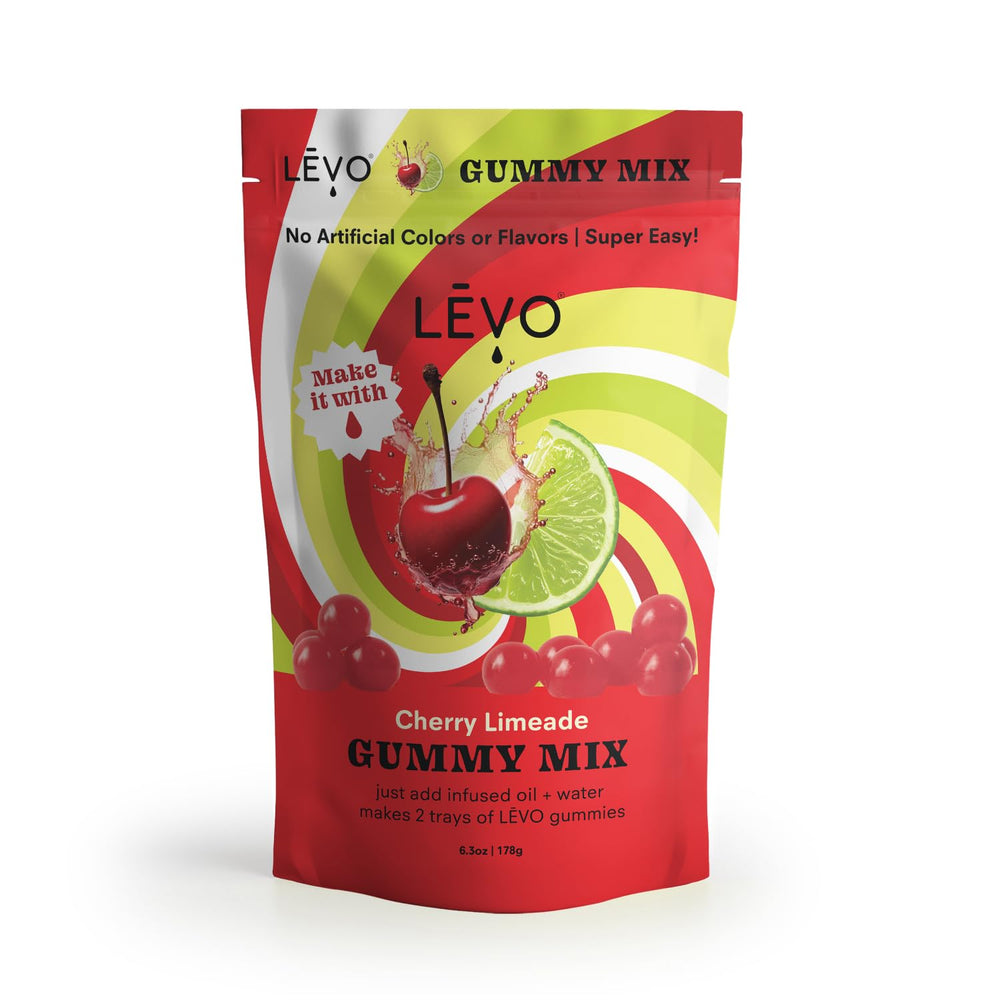 LEVO pouring Cherry Limeade gummy mixture into silicone molds for straightforward preparation