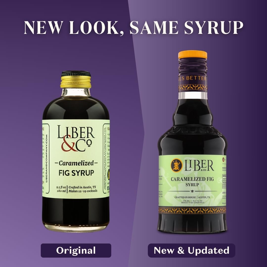 Bottle of Liber & Co. fig syrup shown next to figs and citrus for scale and ingredient context