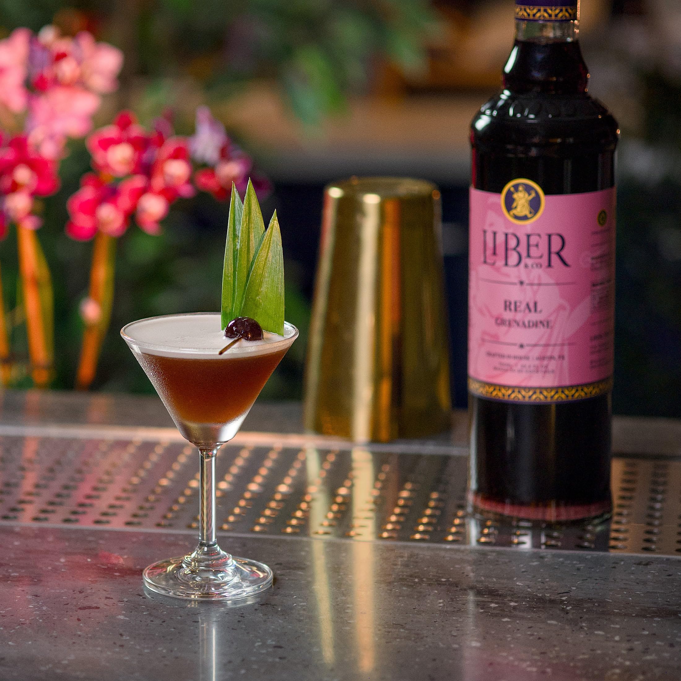 Liber & Co. Tequila Sunrise with grenadine delivering balanced sweet-tart flavor