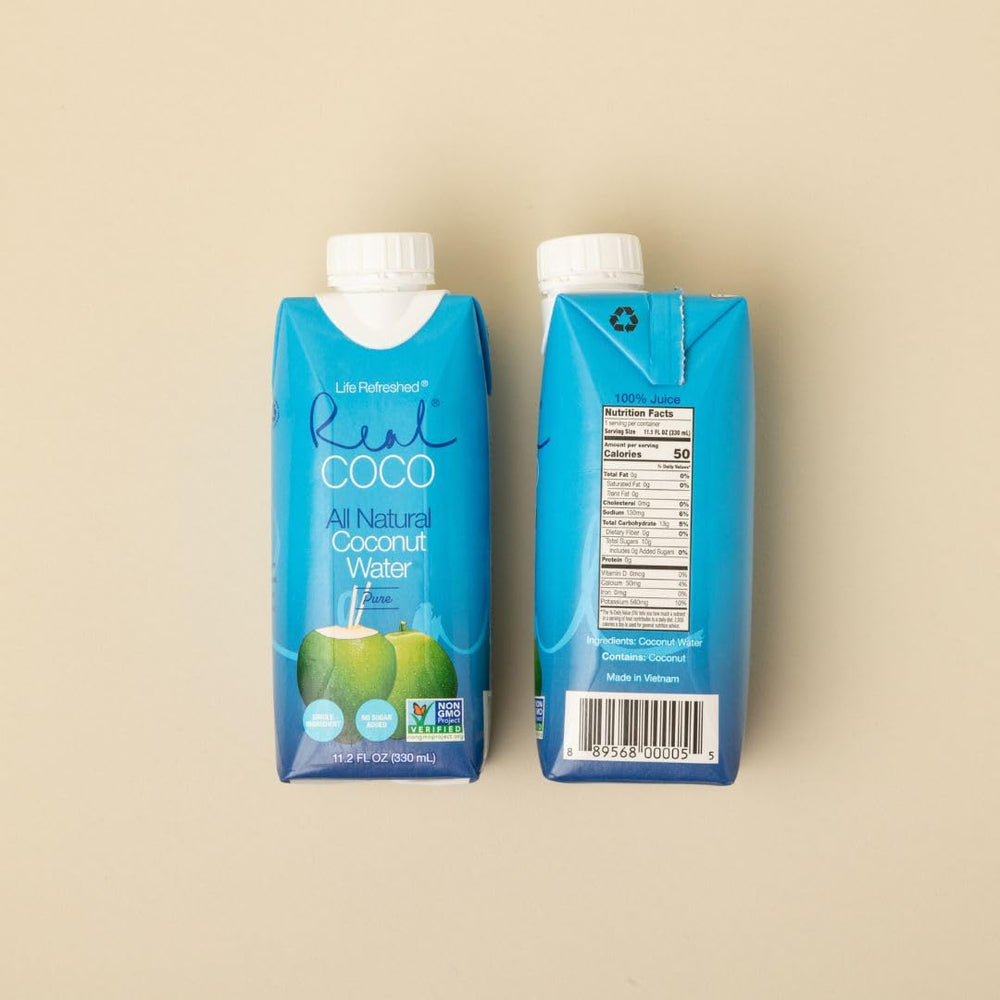 Label close-up on Life Refreshed bottle showing ingredient list and no added sugar benefit