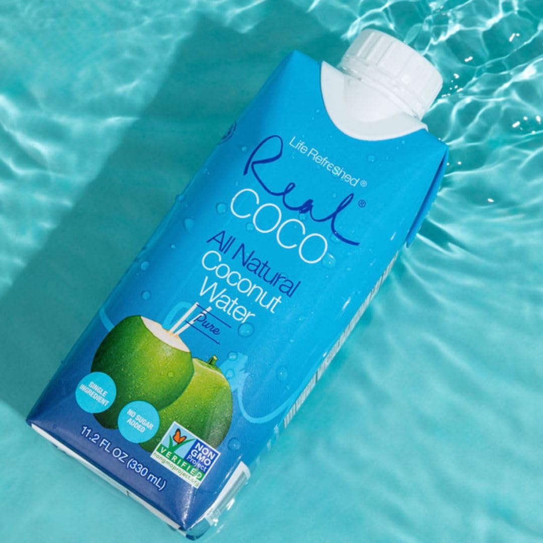 Outdoor picnic scene with Life Refreshed bottles showing convenient on-the-go hydration benefit