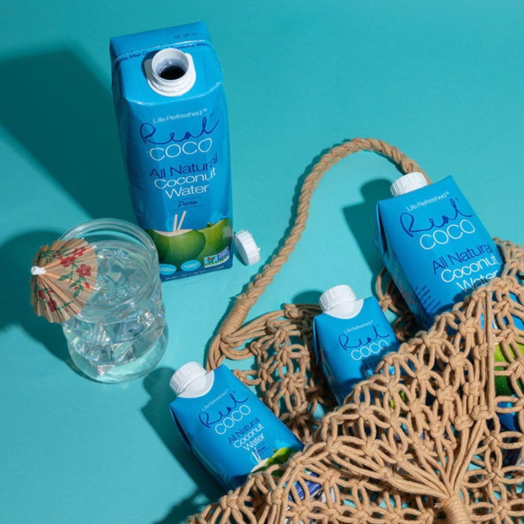 Life Refreshed bottle on table with food to show versatile serving and pairing benefit