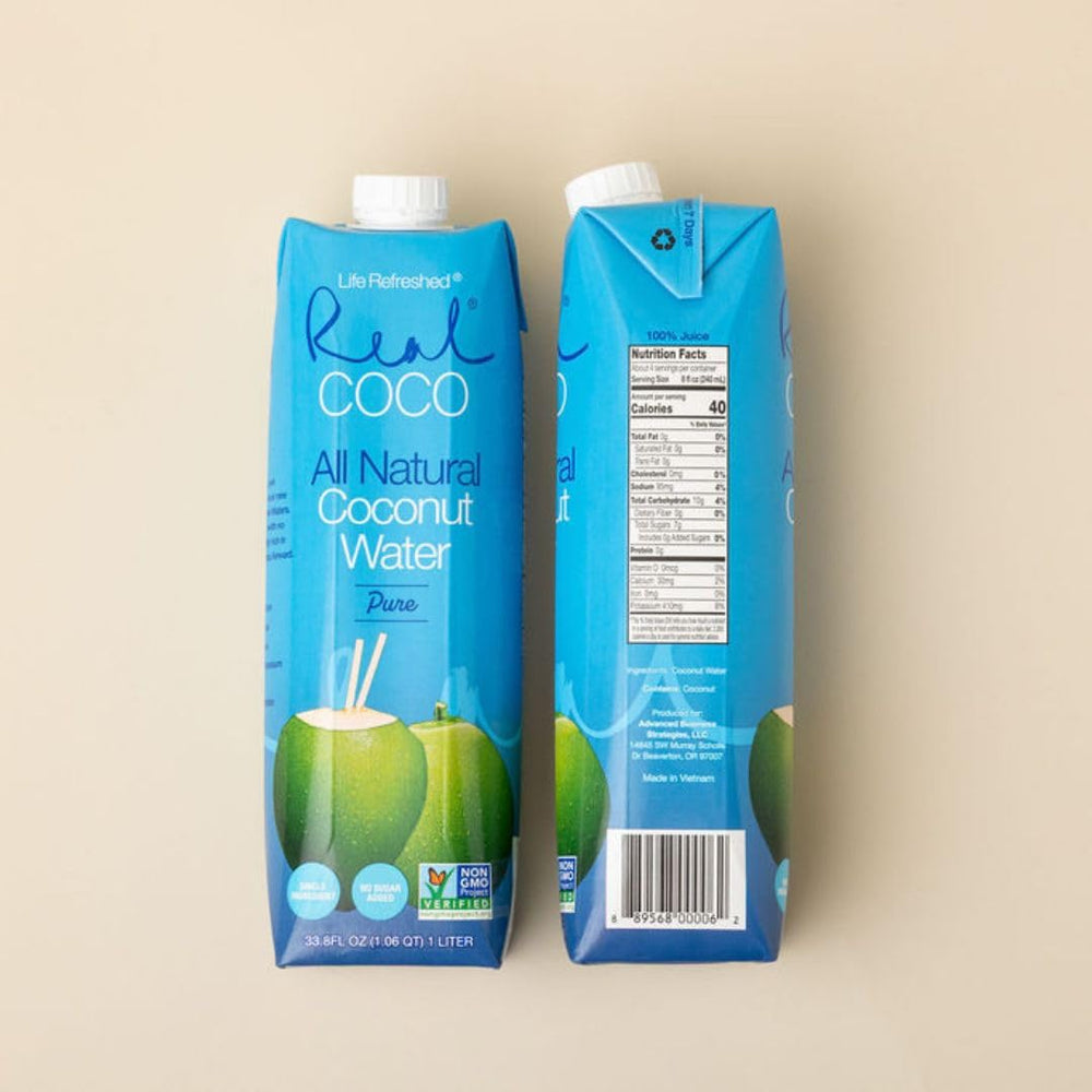 Life Refreshed bottle in hand to show 1L scale and convenient serving benefit