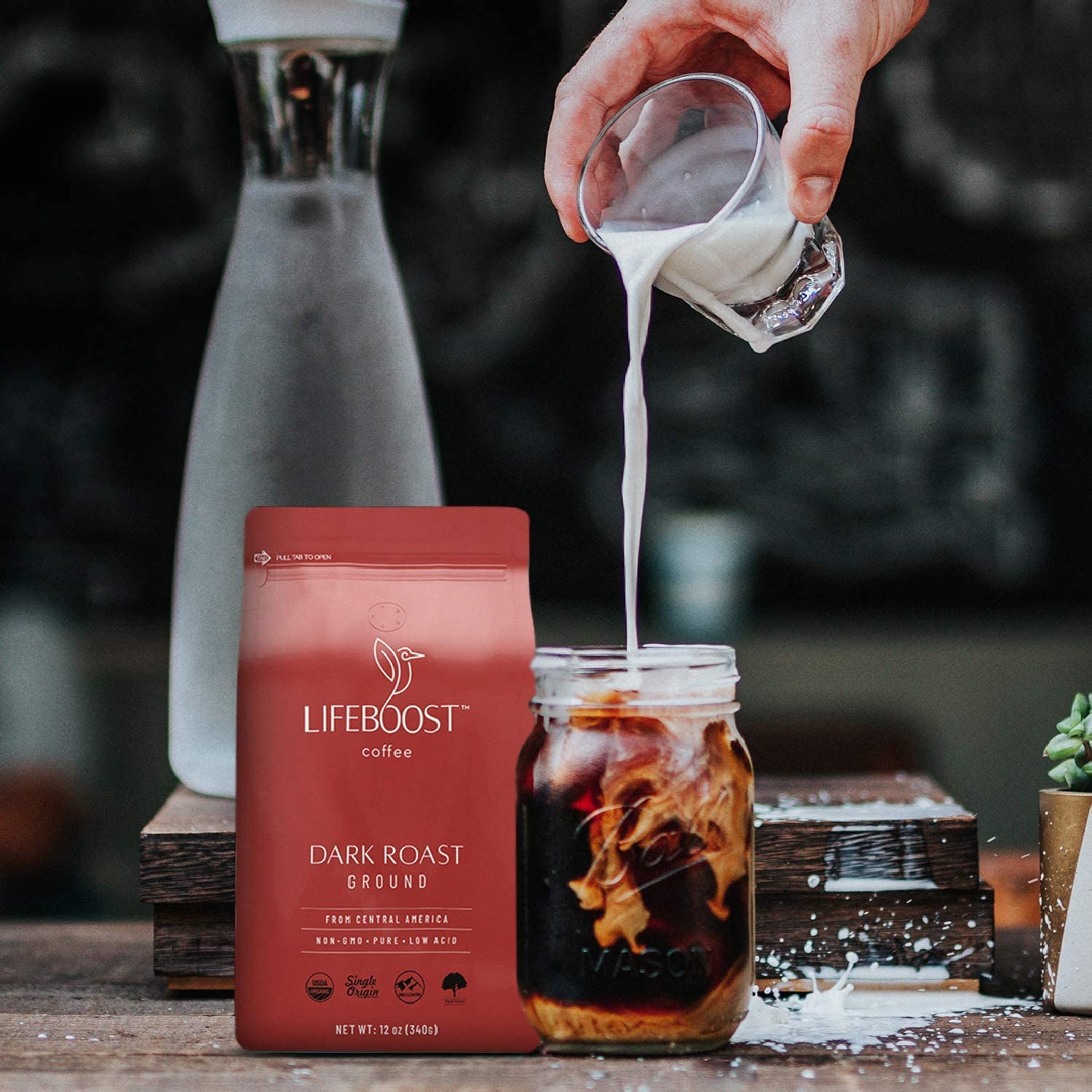 LIFEBOOST open bag with spoon of grounds highlighting convenience and ready-to-brew quality