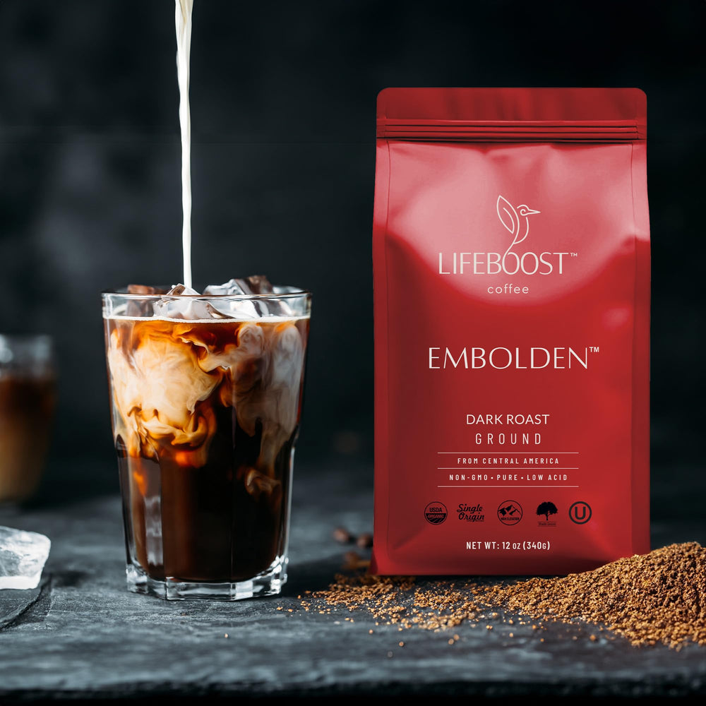 Lifeboost coffee pouring into filter illustrating smooth low-acid brew