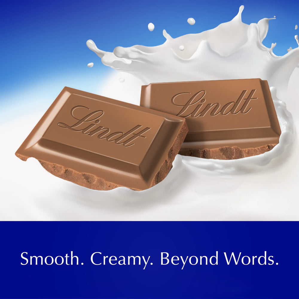 Hand holding Lindt bar showing 4.4 oz scale and portion control benefit