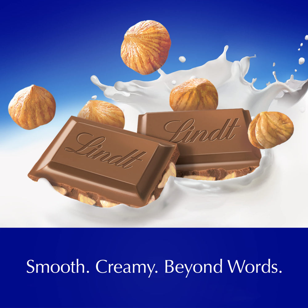 Lindt bar held in hand for size comparison, clear portion guidance