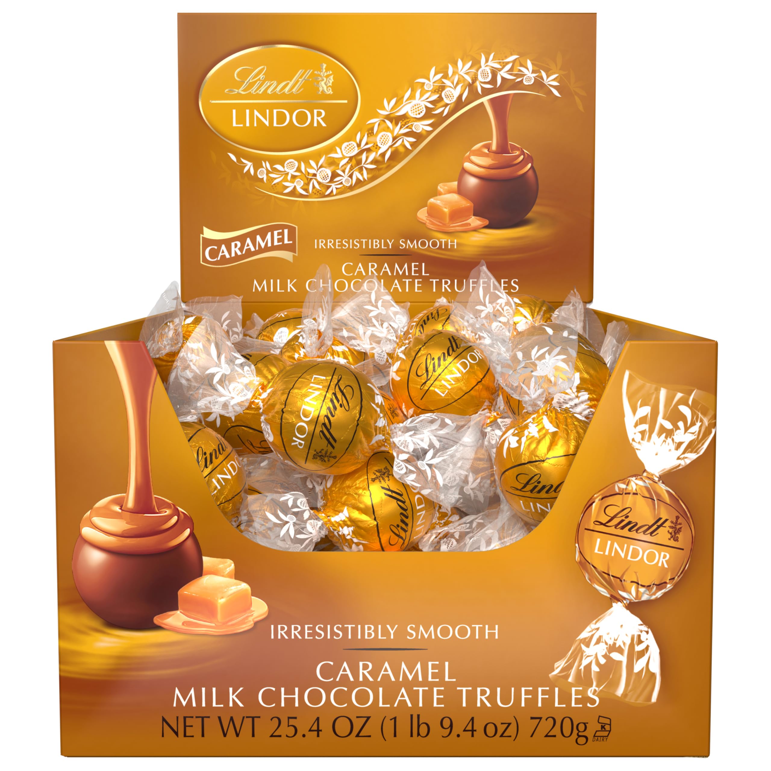 Lindt LINDOR truffles beside coffee in a cozy setting for pairing enjoyment