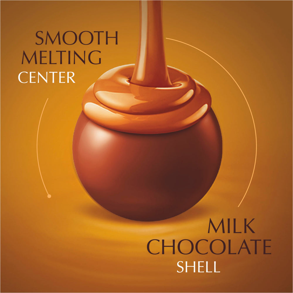 Close-up of a single Lindt LINDOR caramel truffle highlighting smooth shell