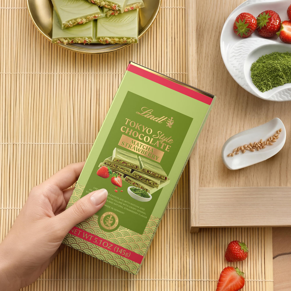 Lindt bar unwrapped revealing matcha filling and white chocolate for indulgence