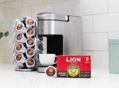 Lion Coffee single-serve pod close-up displaying sealed freshness and quality