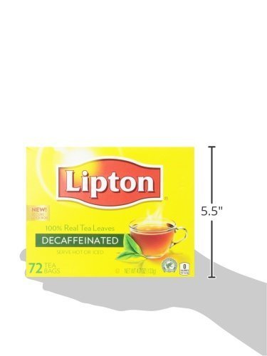 Lipton decaffeinated steaming cup in hand showcasing warm, caffeine-free comfort