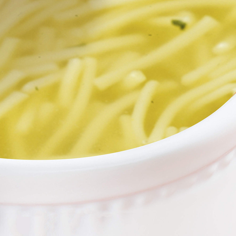 SOUP SECRETS bowl next to measuring cup showing portion and serving size