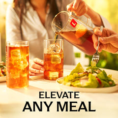 Pouring Lipton Southern Sweet tea into a glass showing smooth refreshing pour