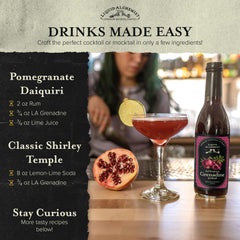 Liquid Alchemist bottle beside fresh pomegranate and orange for freshness