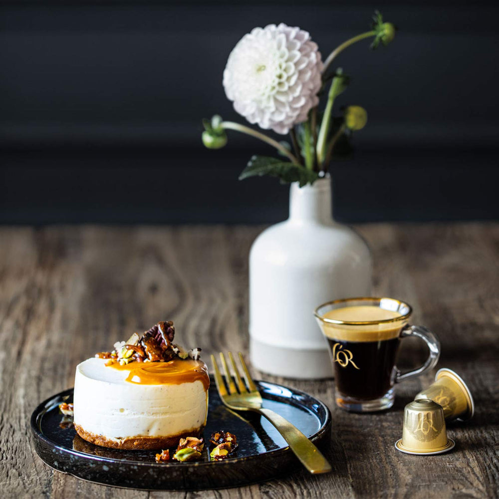 L'OR lifestyle breakfast scene with capsule pack showing quick, quality morning coffee