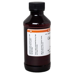 Close-up of LorAnn Oils dropper dispensing a drop to control concentrated cake batter flavor