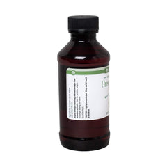 Close-up of LorAnn Green Apple SS Flavor bottle neck and cap highlighting quality seal and dosage control