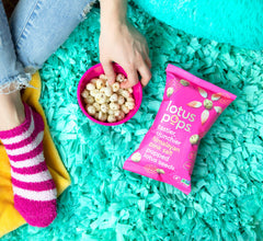 Lotus Pops served in a bowl on salad adding grain-free crunchy topping benefit
