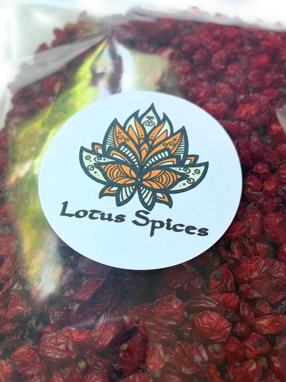 Lotus Spices label close-up highlighting non-GMO and ingredient transparency benefit