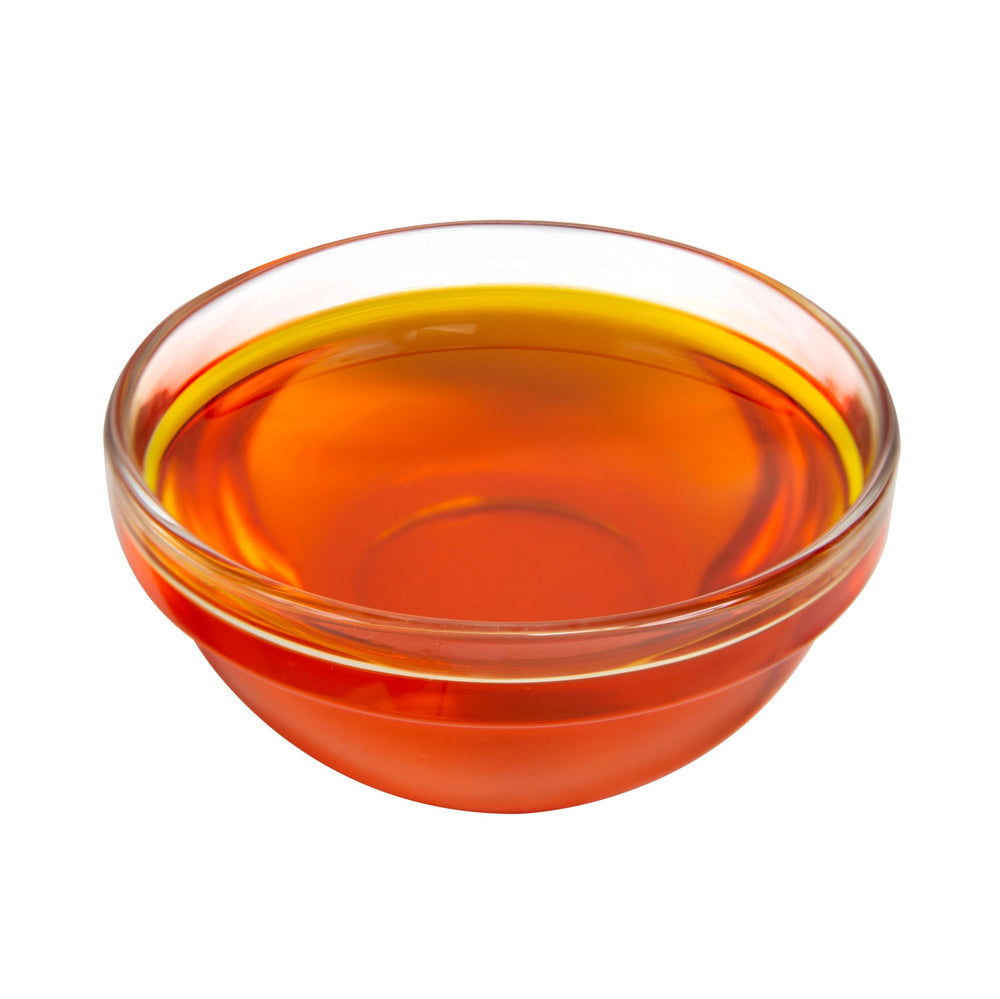 Close-up of LouAna oil texture demonstrating smooth consistency and reduced separation