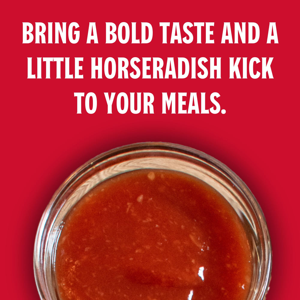 Fresh horseradish and lemon with Louisiana Fish Fry bottle showcasing natural ingredients