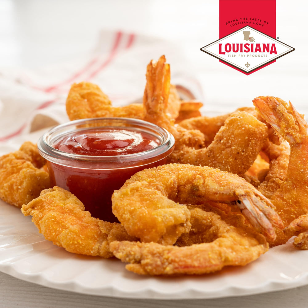 Louisiana Fish Fry sauce plated with shrimp cocktail to enhance seafood flavor