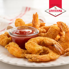 Louisiana Fish Fry sauce plated with shrimp cocktail to enhance seafood flavor