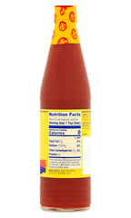 Louisiana brand pouring on scrambled eggs to add bright tang and lift breakfast flavors