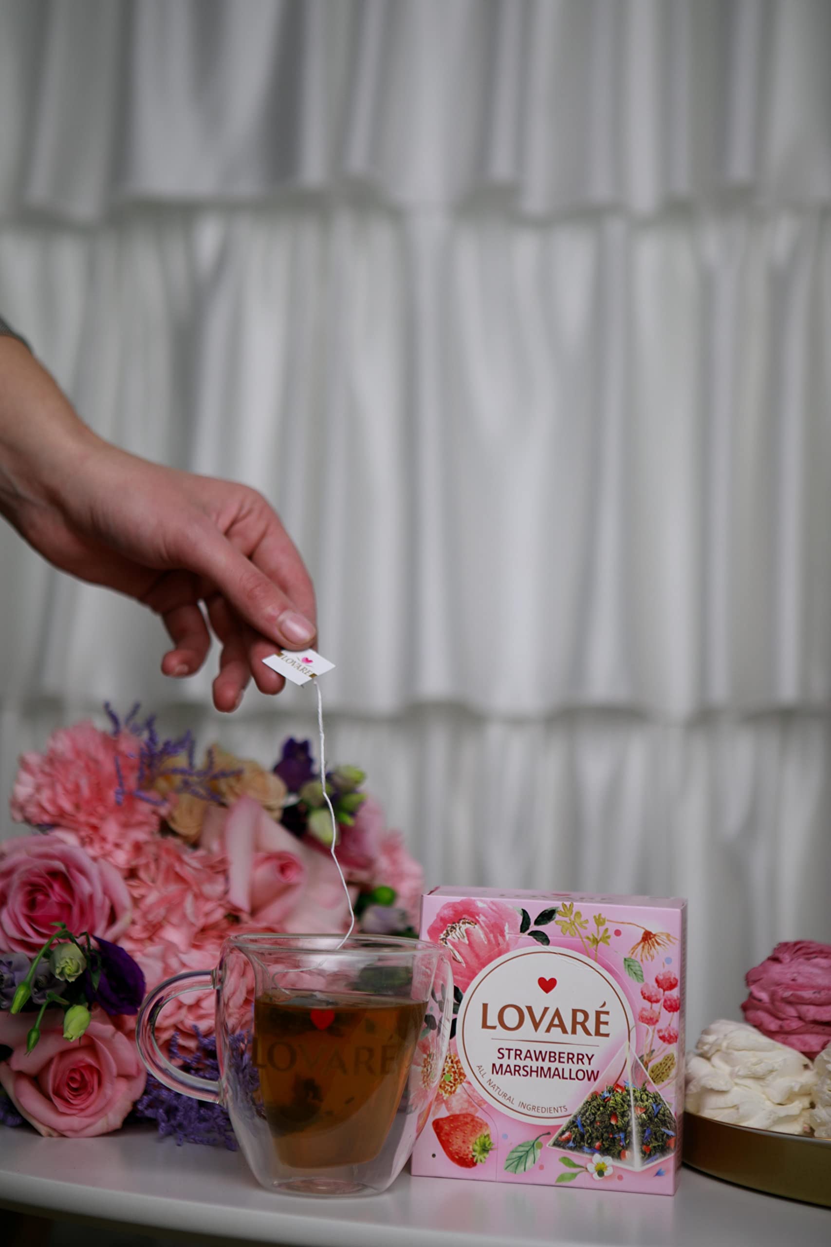 LOVARE Sparkling Splashes pyramid brewing in cup showing bright, fragrant infusion